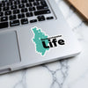 Turquoise Derwentwater map sticker with black text "Derwentwater Life" on a laptop.