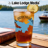 Glass of iced tea with a lemon slice, featuring "Lake Lodge Media" and "Arrowhead" graphics.