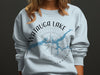 Light blue sweatshirt with Watauga Lake and Tennessee map graphic.