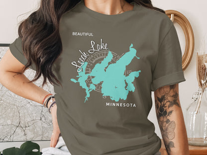 T-shirt featuring a teal map outline of Leech Lake, Minnesota.