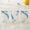 Three glasses with "Eklutna Lake Alaska" and a blue map overlay and compass rose.