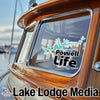Boat window sticker with Powell Life logo and Lake Lodge Media branding.