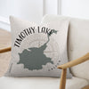 Timothy Lake Oregon map design on light-colored pillow with compass detail.