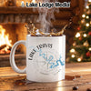 White mug with "Lake Travis Texas" and compass rose design.