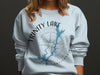 Light blue sweatshirt with Trinity Lake California map and compass design.