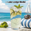 Glass of lemonade with limes and mint, beach background, "Savannah Island" text.