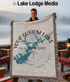 Man holding custom lake map blanket with "YOUR CUSTOM LAKE" text.