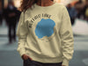 Light yellow sweatshirt with Buffalo Lake Minnesota graphic and compass design.