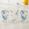 Three clear glasses with Broadway Lake map and compass design.