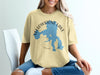 Yellowstone Lake map design with compass and text "Wyoming" on tan t-shirt.