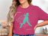 Teal Longview Lake map graphic with compass rose and text on pink shirt.