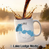 White mug with Forest Lake, Minnesota map and compass design, coffee splash
