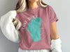 Rose t-shirt features a teal map outline of Lake Tahoe and text.