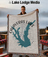 Woven blanket with Calaveras Lake Texas map and compass rose design.
