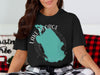 Black t-shirt with teal Lake George, Florida map and compass graphic.