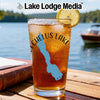 Glass of iced tea with blue Lake Chelan map, lemon slice, and "Lake Lodge Media" logo.