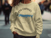 Sweatshirt with "North Channel Ontario" text and a blue map outline over a compass.