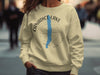Canadice Lake New York graphic on a tan crewneck sweatshirt.