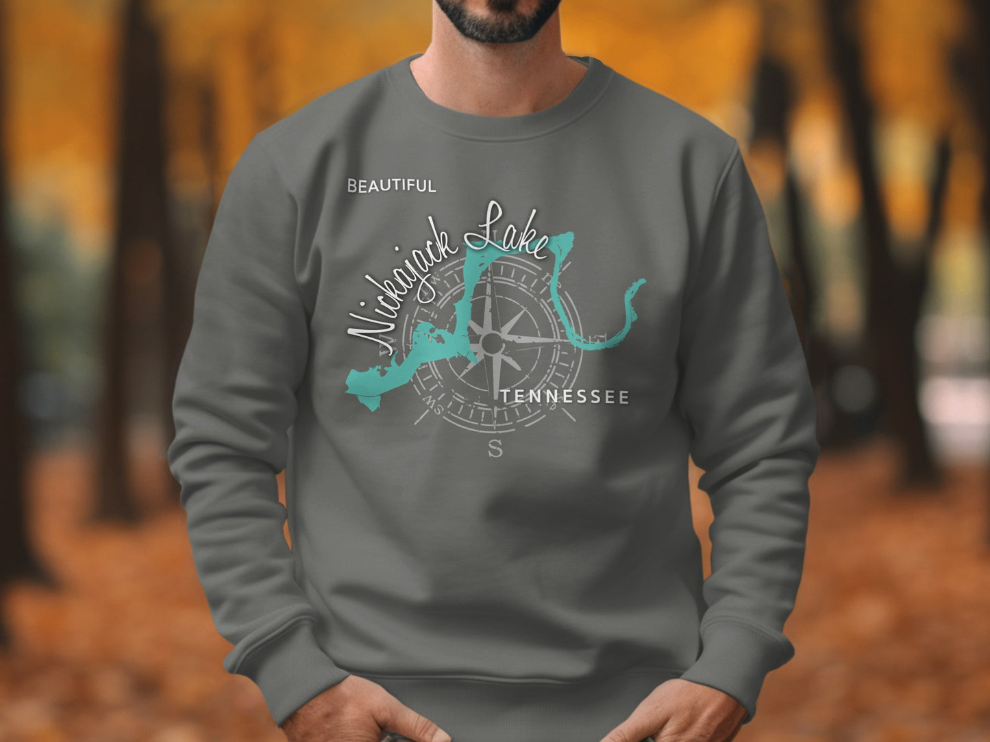 Crewneck sweatshirt with Nickajack Lake Tennessee map and compass graphic.