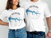 White t-shirts with "Lake Rayburn Arkansas" and compass design.