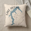 Cream pillow with blue Lake Jacomo map, compass, and Missouri text.