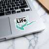 Sticker with "Seminole Life" text above a teal lake outline on a laptop.