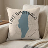 Light beige pillow with blue Lake Winnebago map and compass design.