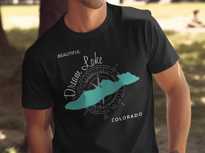 Black t-shirt featuring a teal outline of Dream Lake, Colorado, with a compass rose.