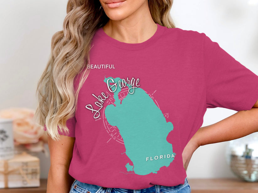 Pink t-shirt with turquoise Lake Okeechobee, Florida map and compass.
