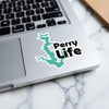 Turquoise lake outline sticker with "Perry Life" text on a laptop.