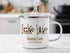White enamel mug with "Donner Lake California" and lake-themed graphics.