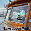 Mark Twain Life sticker on boat window with Lake Lodge Media text below.
