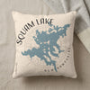 Cream pillow with blue Squam Lake map graphic and text.
