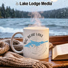 White mug with "Big Bear Lake California" and compass design on window sill.