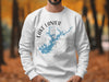 White sweatshirt with Lake Lanier Georgia map and compass graphic.