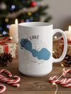 White mug with blue Pearl Lake, Wisconsin map and compass graphic.