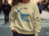 Yellow sweatshirt with blue Hebgen Lake, Montana graphic and compass design.