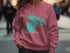Pink sweatshirt with "Beautiful Floyd Lake" and map design.