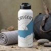 White water bottle with "GREGORY" and "CALI" text, compass graphic, and blue mountain design.