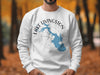 White sweatshirt with blue Lake Livingston Texas map and compass design.