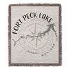 Fort Peck Lake Montana map and compass design on a fringed blanket.