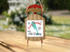 Sled ornament with "Merry Christmas FROM Lake Winnipeg" text and snowflakes.