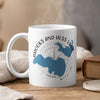 White mug with Brooks and Hess Lake design, compass, and Michigan map.