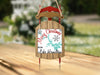 Sled ornament with "Merry Christmas" and "From Lake Hamilton" text.