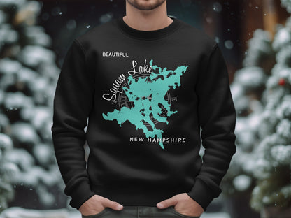 Black sweatshirt with a teal map outline of Squam Lake, New Hampshire.