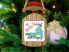 Sled ornament with "Merry Christmas from Lake Gregory" text and snowflake graphics.