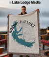 Tapestry blanket with Arkabutla Lake map and Mississippi text over compass rose.