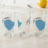 Three clear glasses feature blue Lake Mary maps and compass designs.
