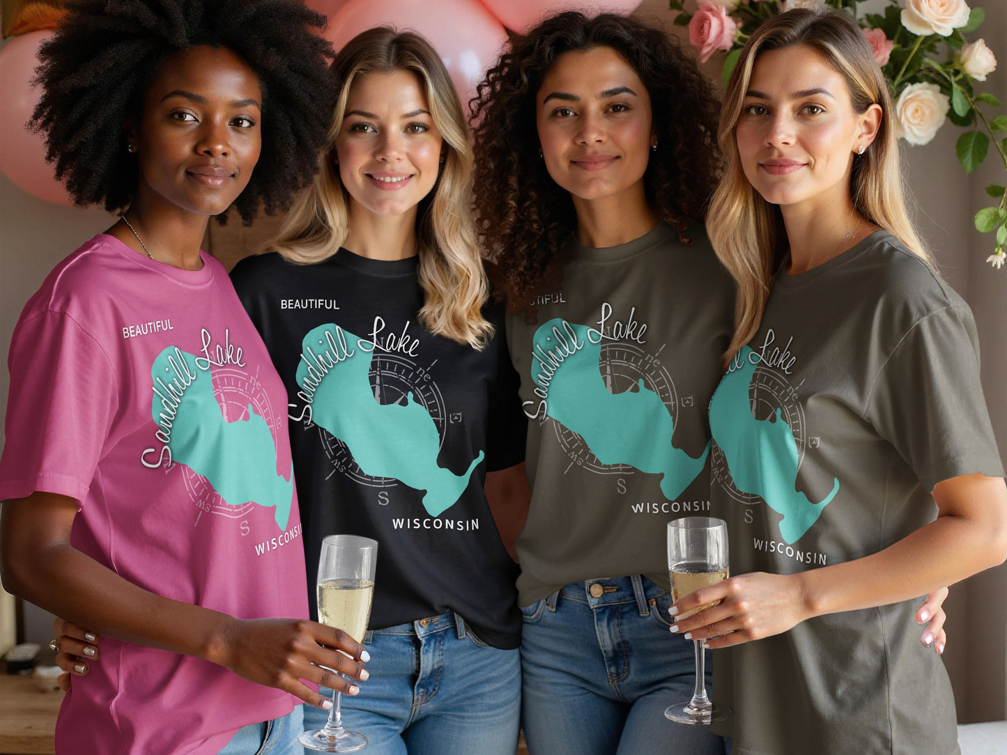 Four women in t-shirts with Sandhill Lake Wisconsin design.
