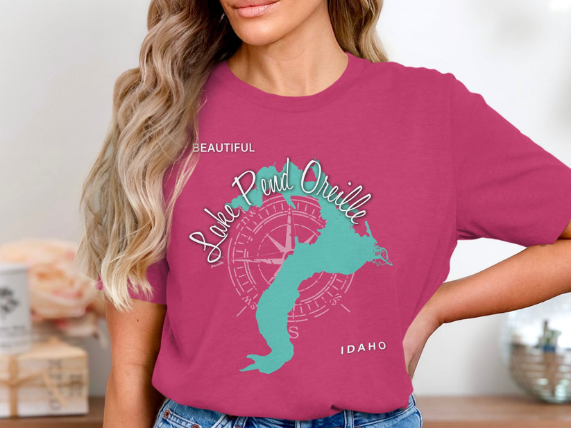 Pink t-shirt with turquoise Lake Pend Oreille, Idaho map and compass graphic.